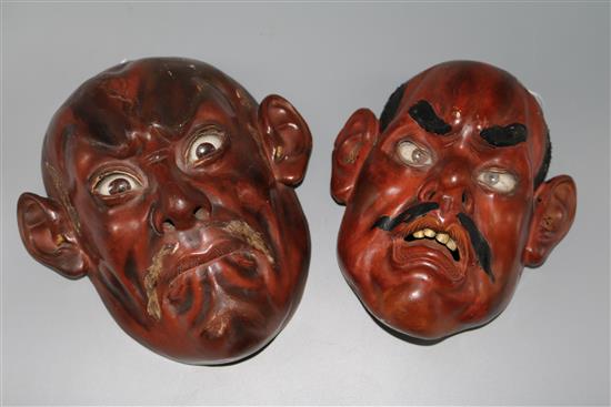 Japanese lacquered wood demon Noh mask and another smaller similar mask